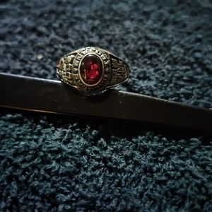 Woman's garnet Class Ring. size 7. see pics